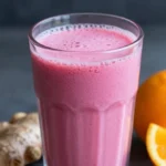 Beet Orange Ginger Smoothie With a Bold Pink Color