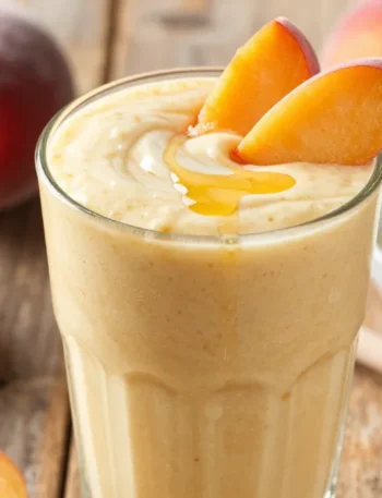 Creamy Dreamy Peach Smoothie Recipe with Frozen Peaches + Yogurt (Sunny, Creamy)